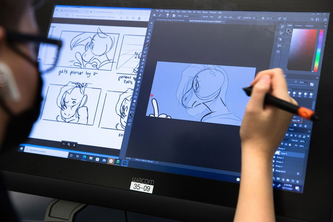 Student drawing digital art on Wacom screen