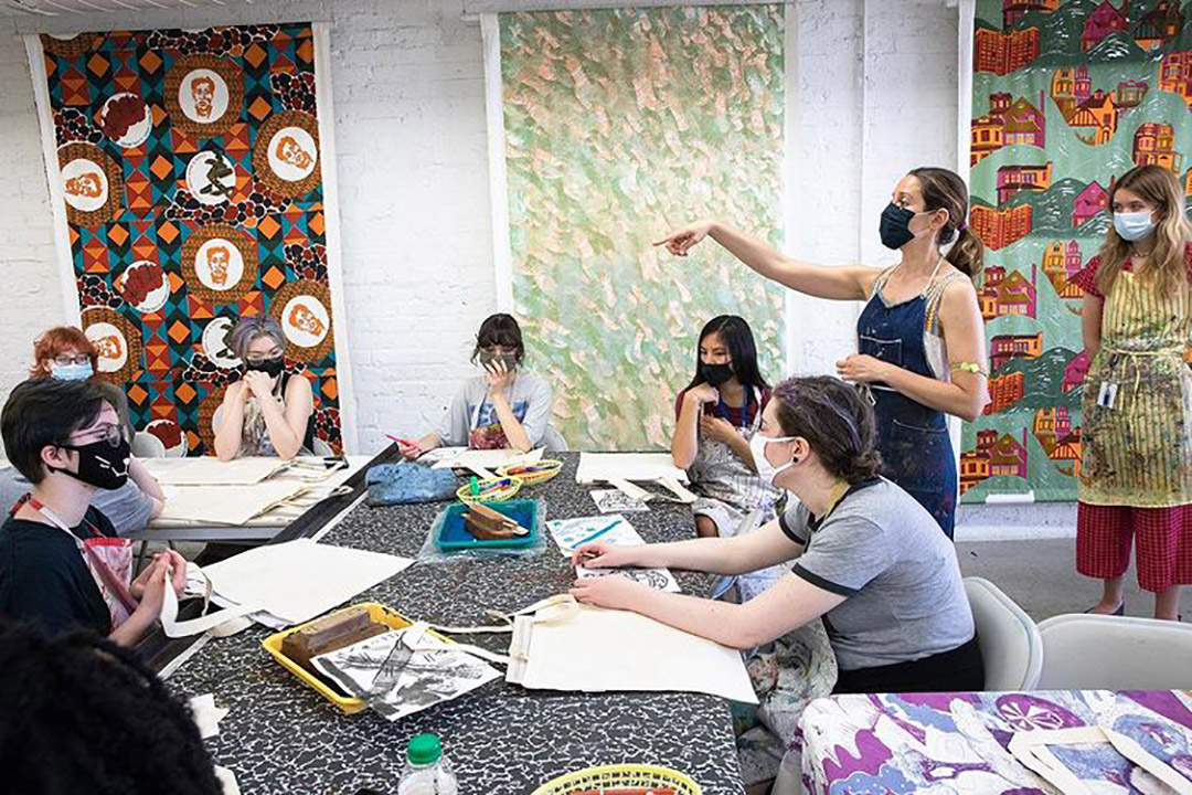Students in art class having a discussion